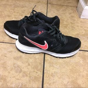 Black and pink Nike shoes
