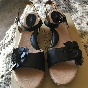 New! Sandals with flower accent.