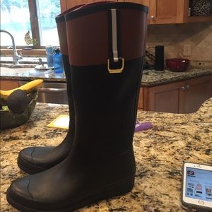Rain boots that are brand new. Tags are still on