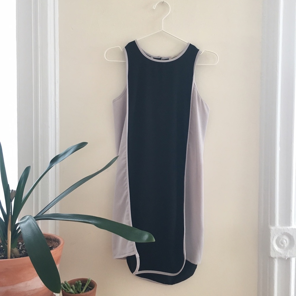black and grey color-blocked geometric dress.