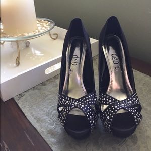 Size 8.5 Deb brand high heeled shoes.