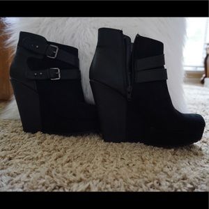 Black bootie heels. Only worn once,Great condition