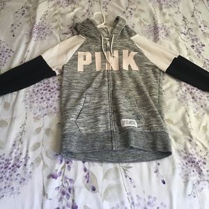 A Victoria secrets pink jacket in a size small