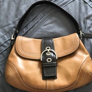 Two tone brown leather Coach shoulder bag.