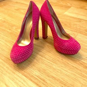 Hot pink heels with metal accents