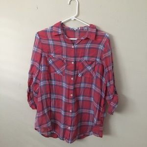 Pinkish-red colored button down flannel