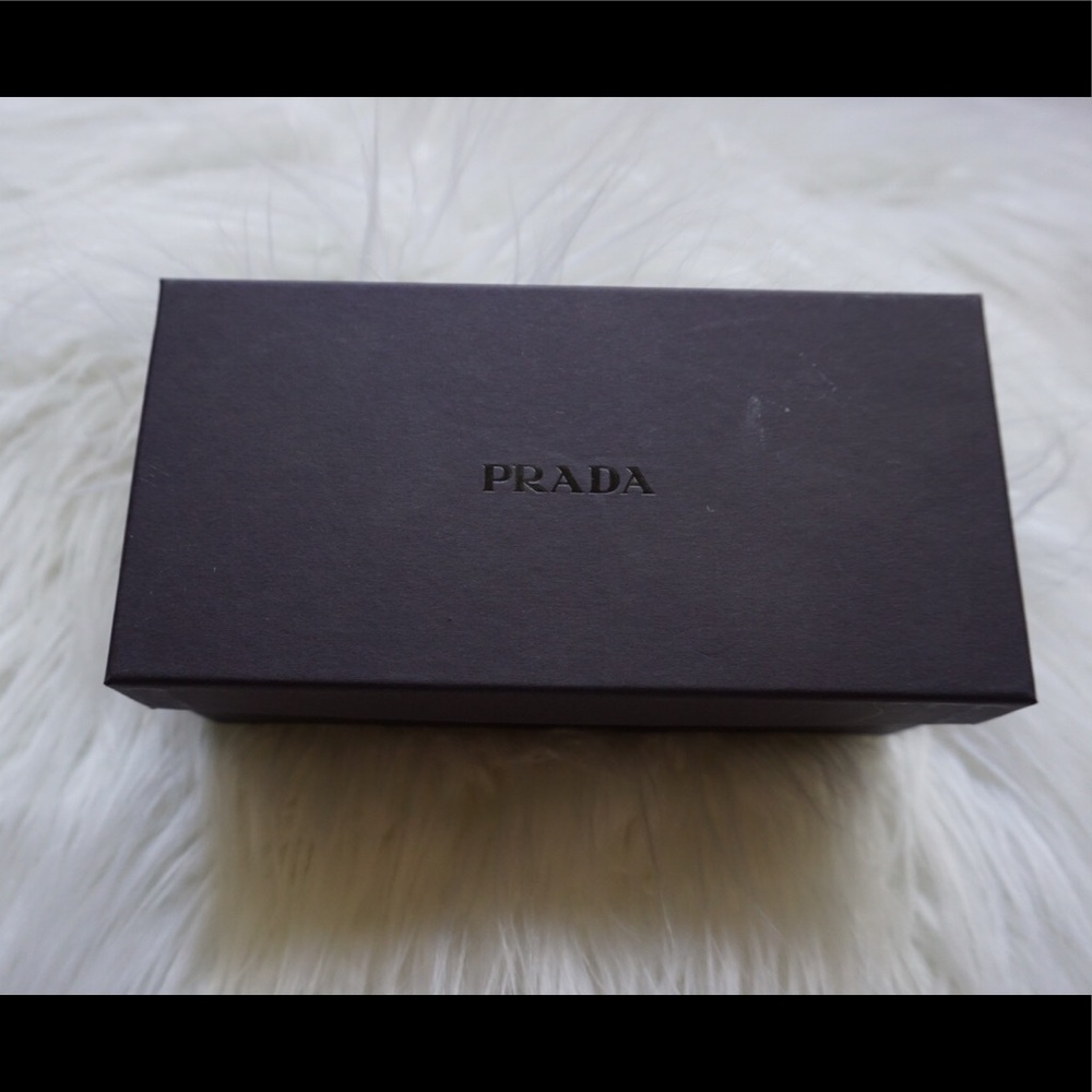 Prada sunglasses. Unisex. Never used
