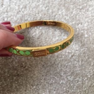 Gold and green Coach bangle bracelet
