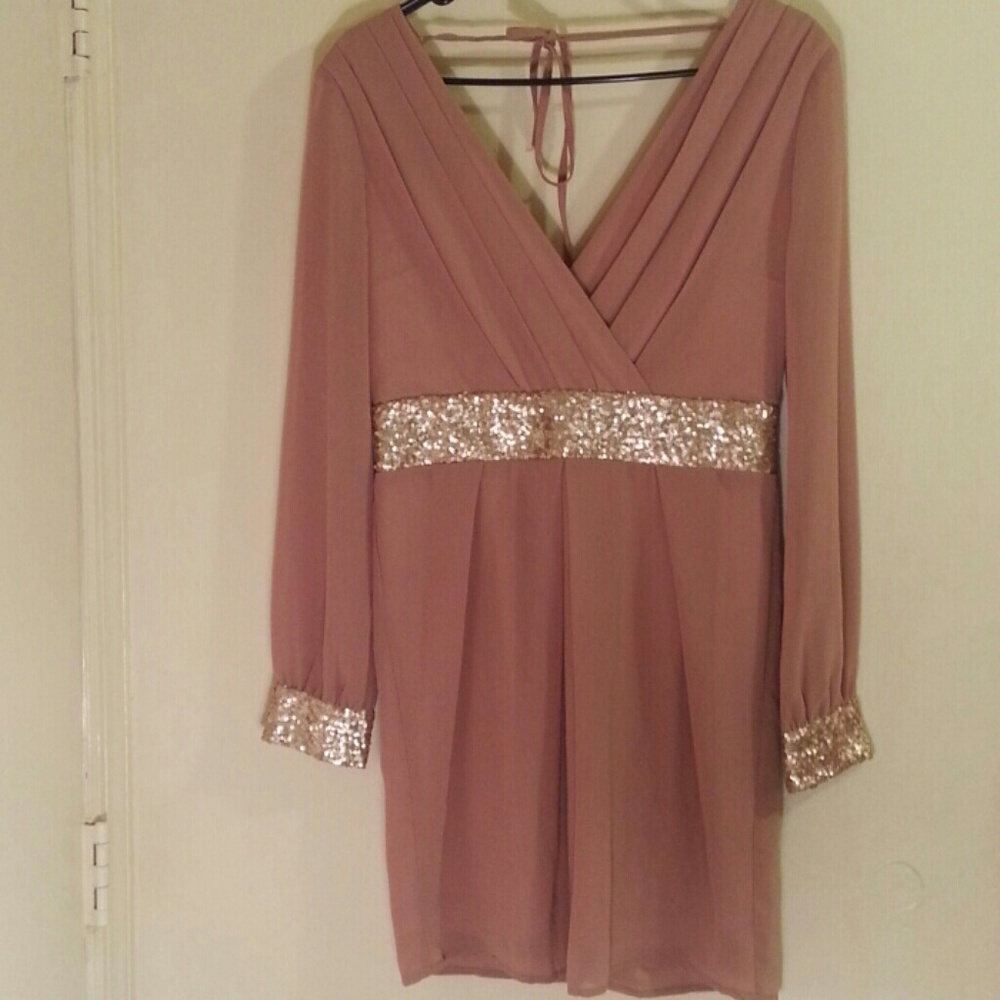 I'm selling a long sleeve dress. Not too short!