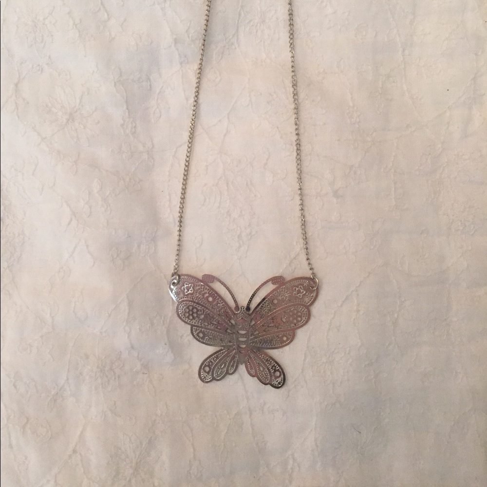 Fun butterfly silver colored necklace!