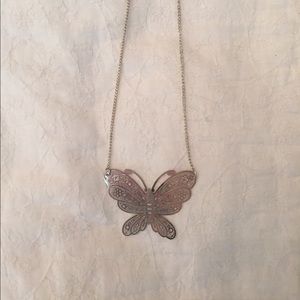 Fun butterfly silver colored necklace!