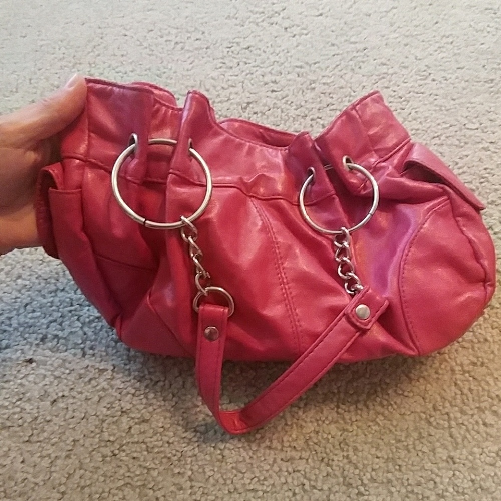 Pink, lots of pockets, used, still good condition