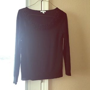 Black sweater with ruffles