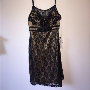 Fancy lace dress with embellishments