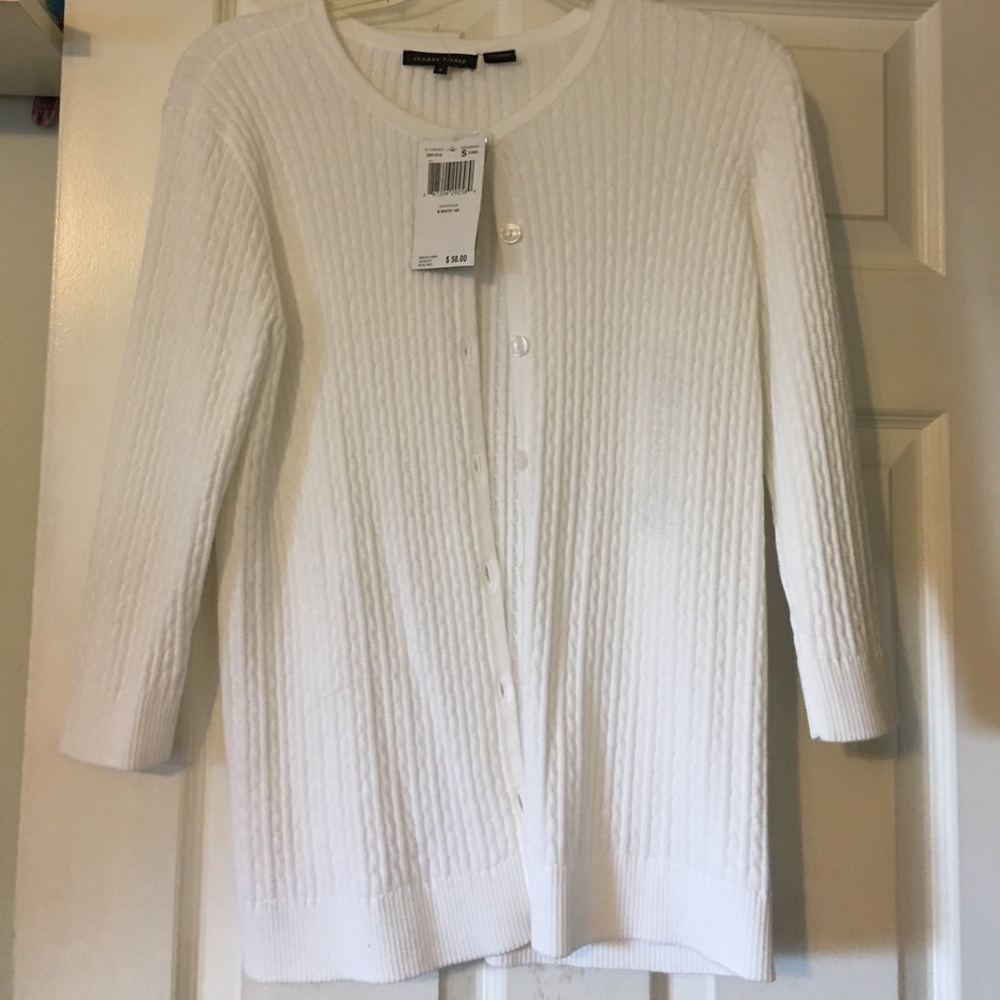 White cableknit button down sweater