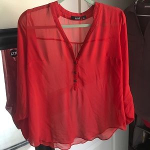 Red flowy sheet blouse