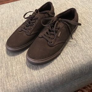 All black vans lace up sneakers