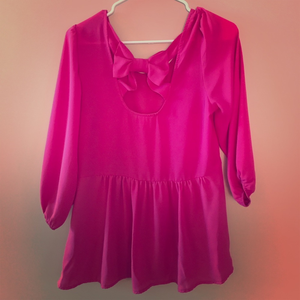 Adorable pink shirt with bow