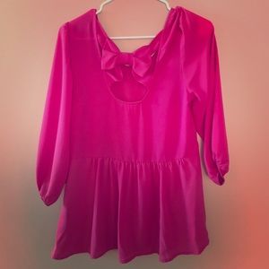 Adorable pink shirt with bow