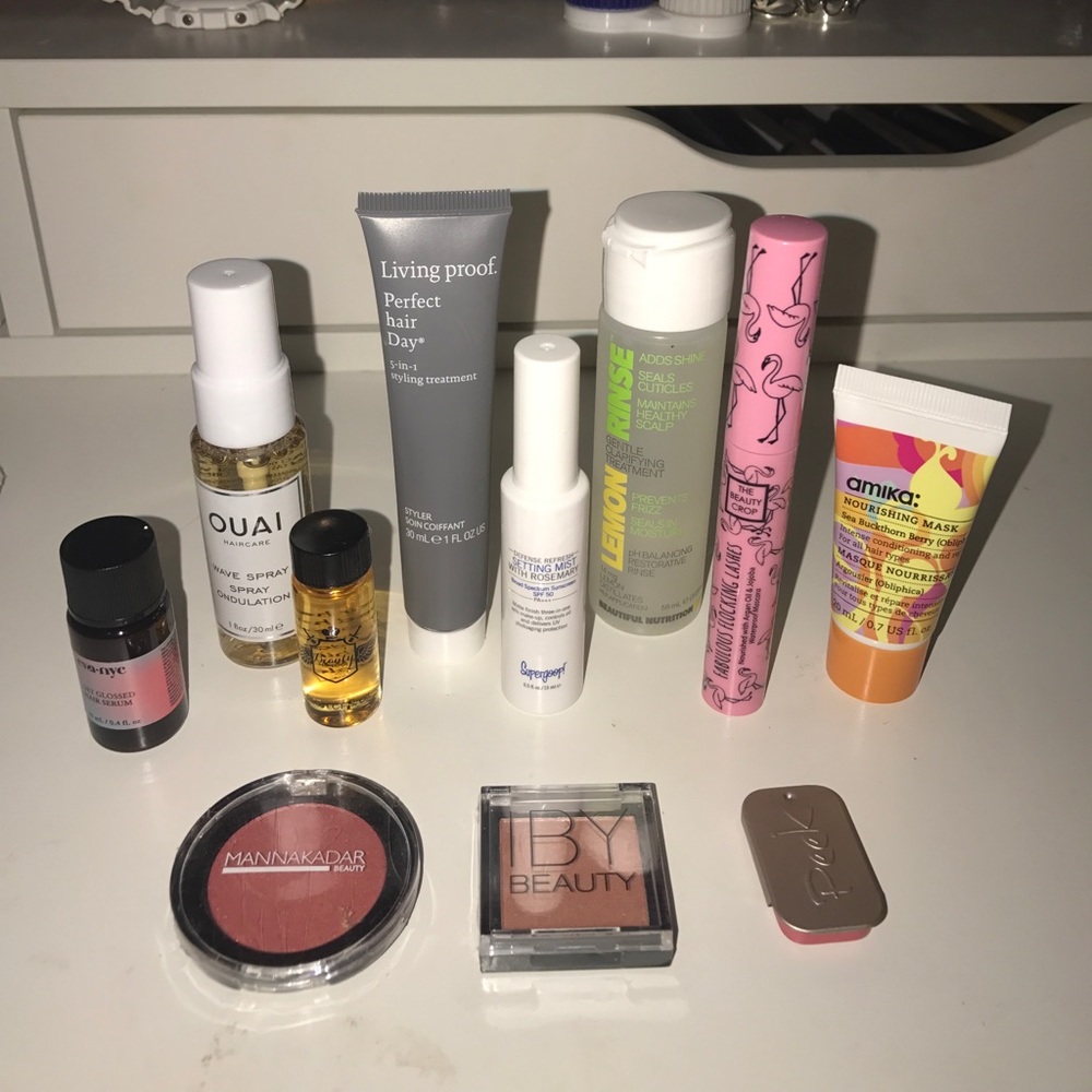 Bundle of hair care stuff, masks, and makeup