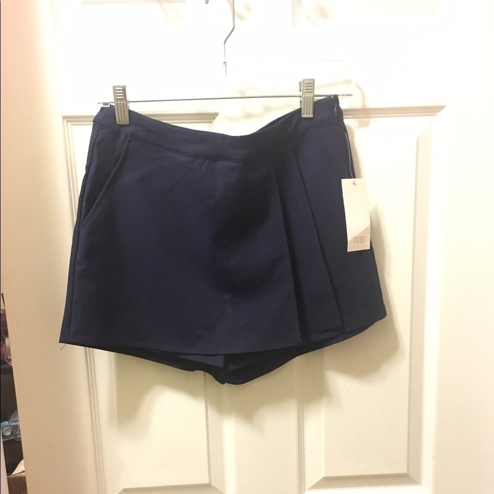 Navy blue wrap over stretch skort.