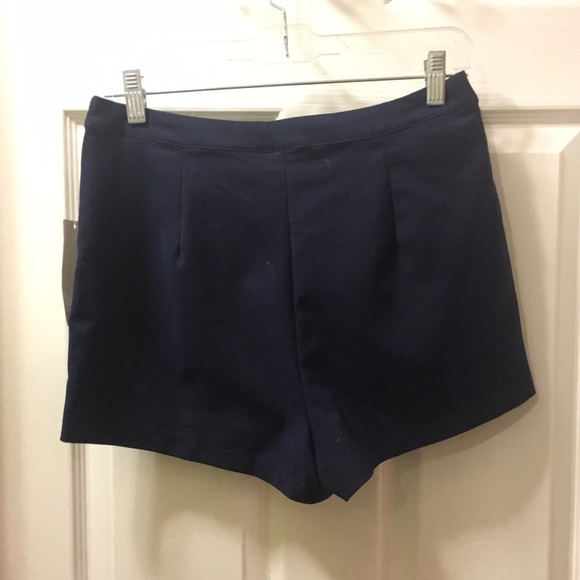 Navy blue wrap over stretch skort. - Picture 2 of 4