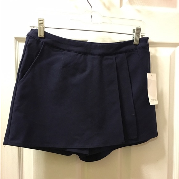 Navy blue wrap over stretch skort. - Picture 3 of 4