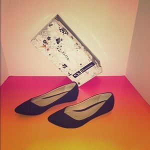 Black suede pointy toe flats