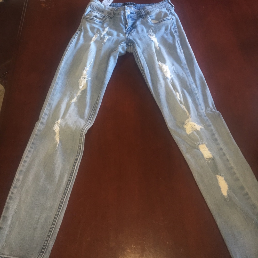 Distressed blue jeans