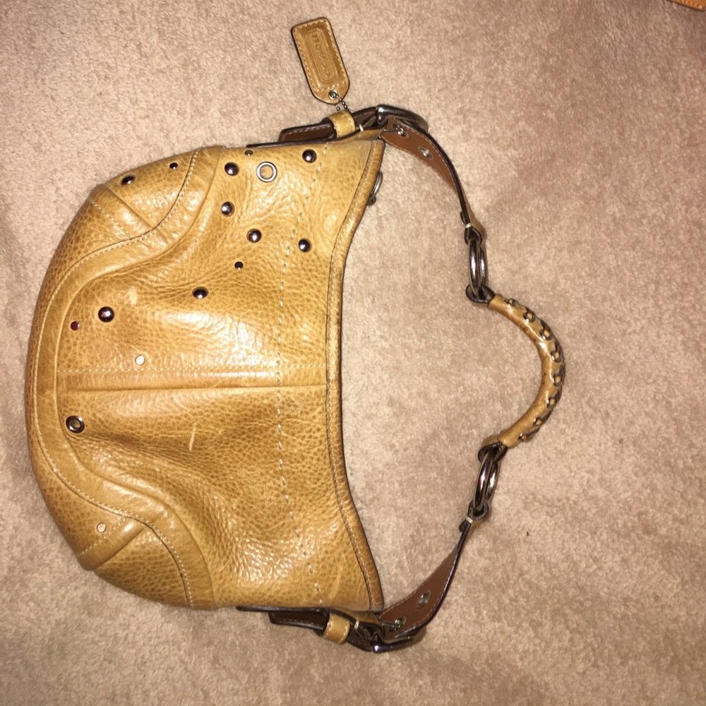 Nude colored Coach purse