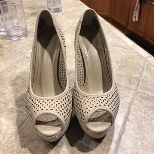 Tan high heals! Worn one time.