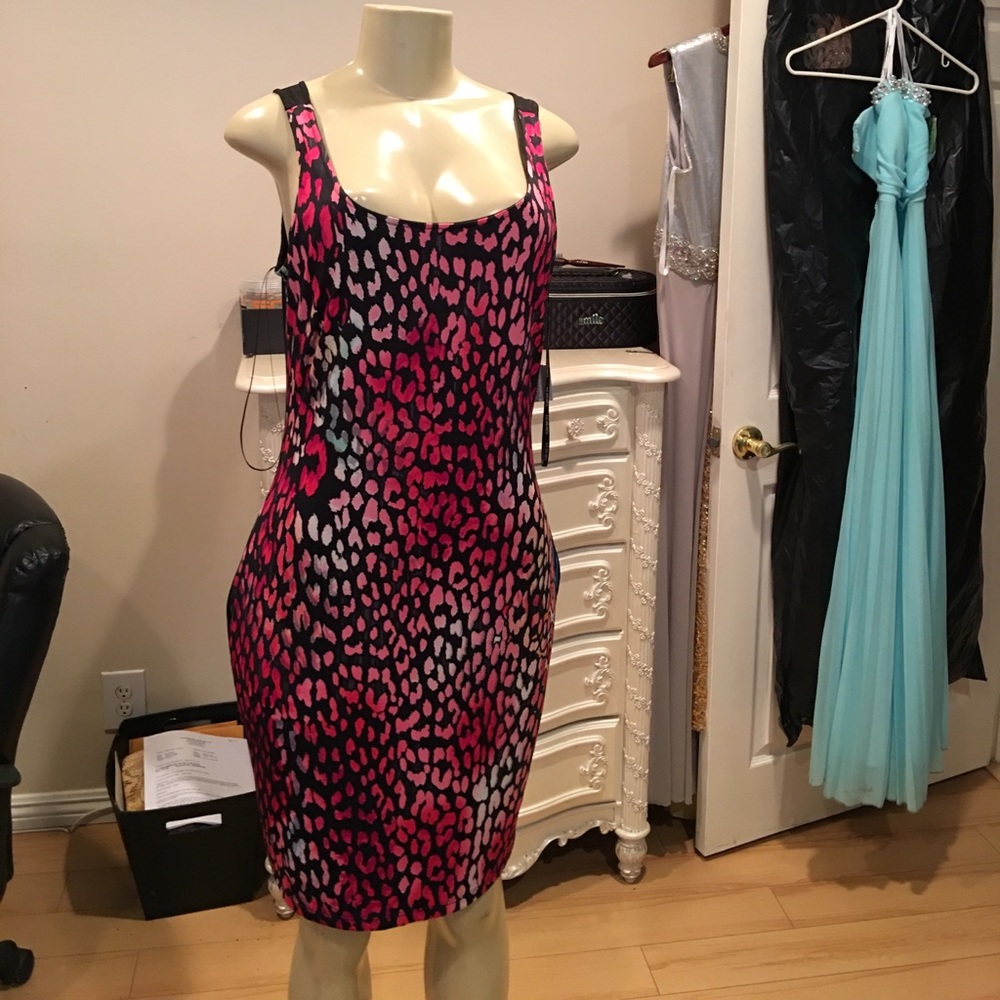 It's a beautiful everyday dress well shaped