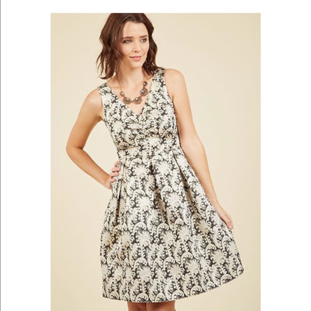 Weekend sale! Black and gold dress with pockets