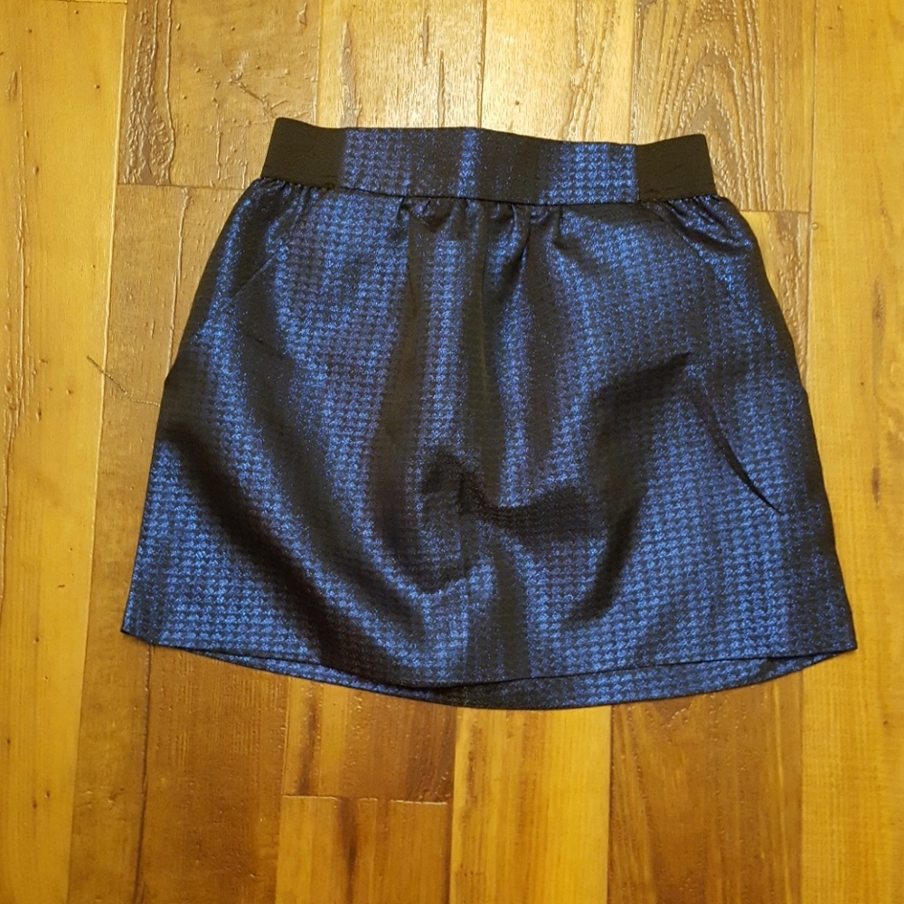 Never worn metallic blue skirt!!