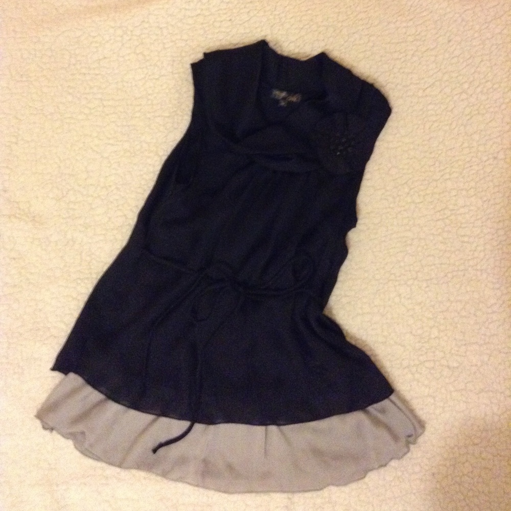 Black crepe top with grey material rose and belt