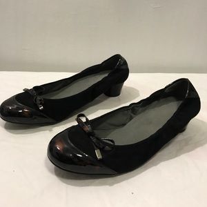 Stuart Weitzman black heels with bow accent