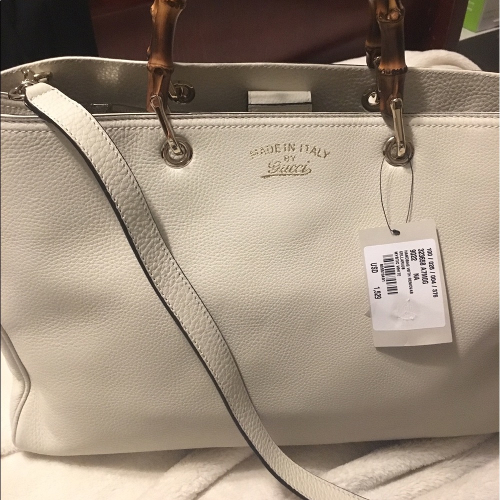 Original white bamboo holder Gucci bag slightly
