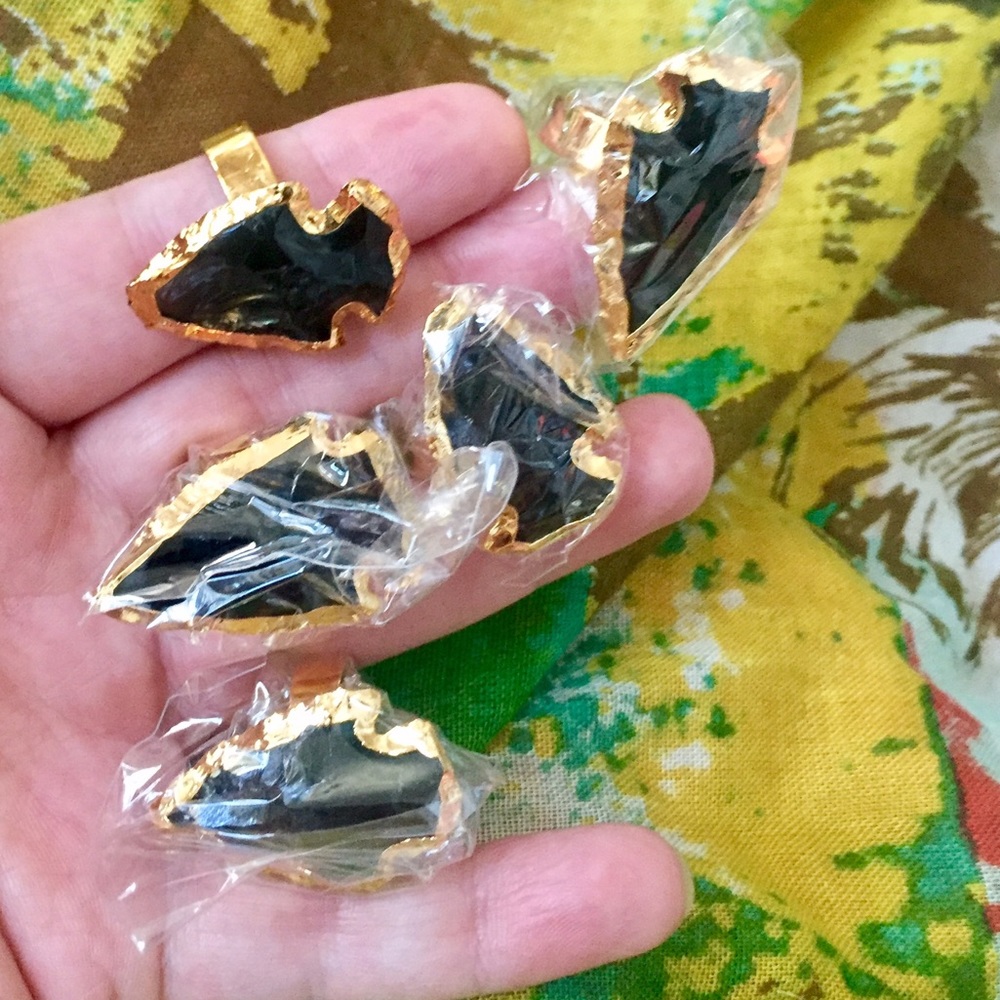 Hand carved obsidian arrow rings. Adjustable.