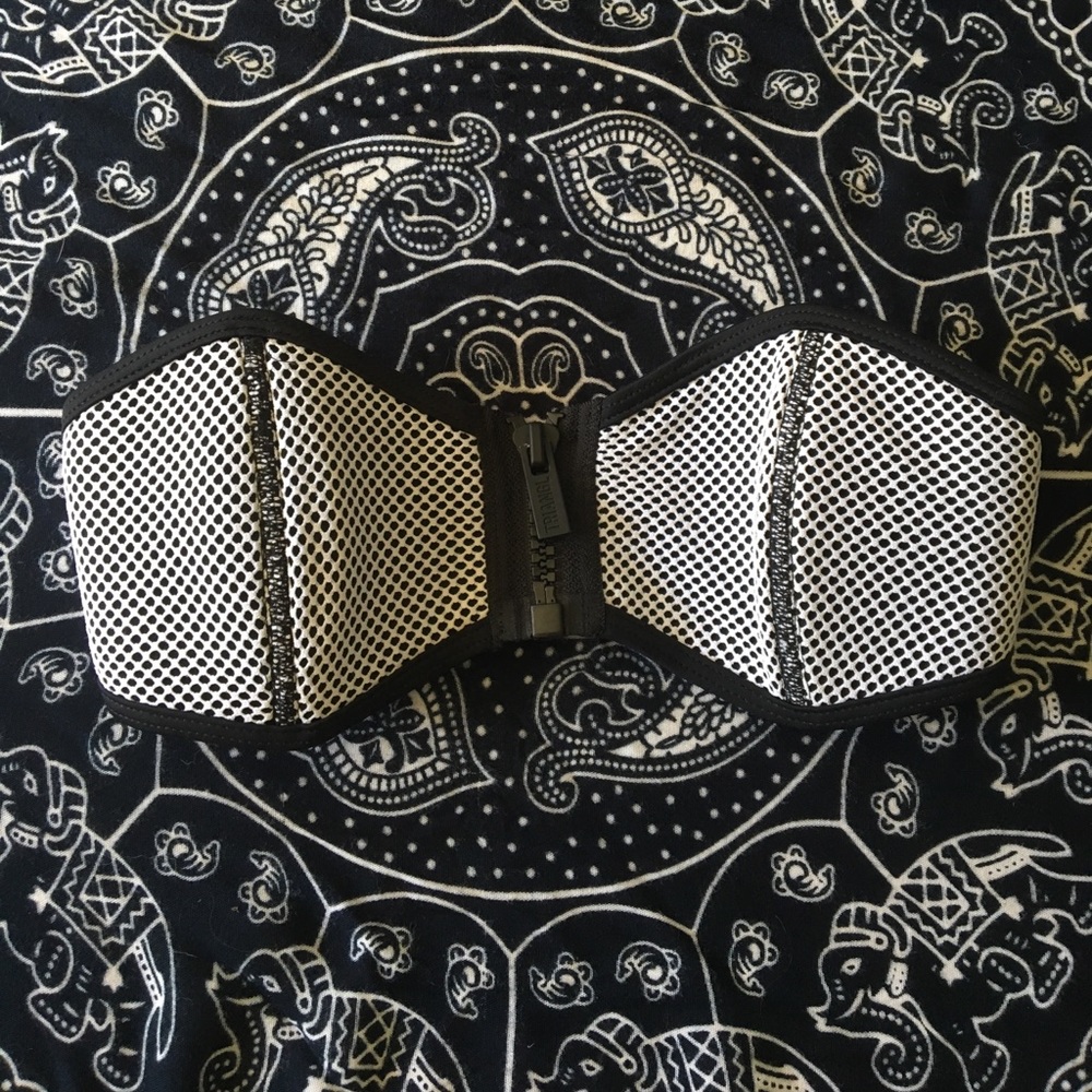 Black and white bikini top .