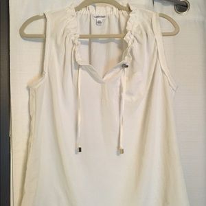 White sleeveless blouse