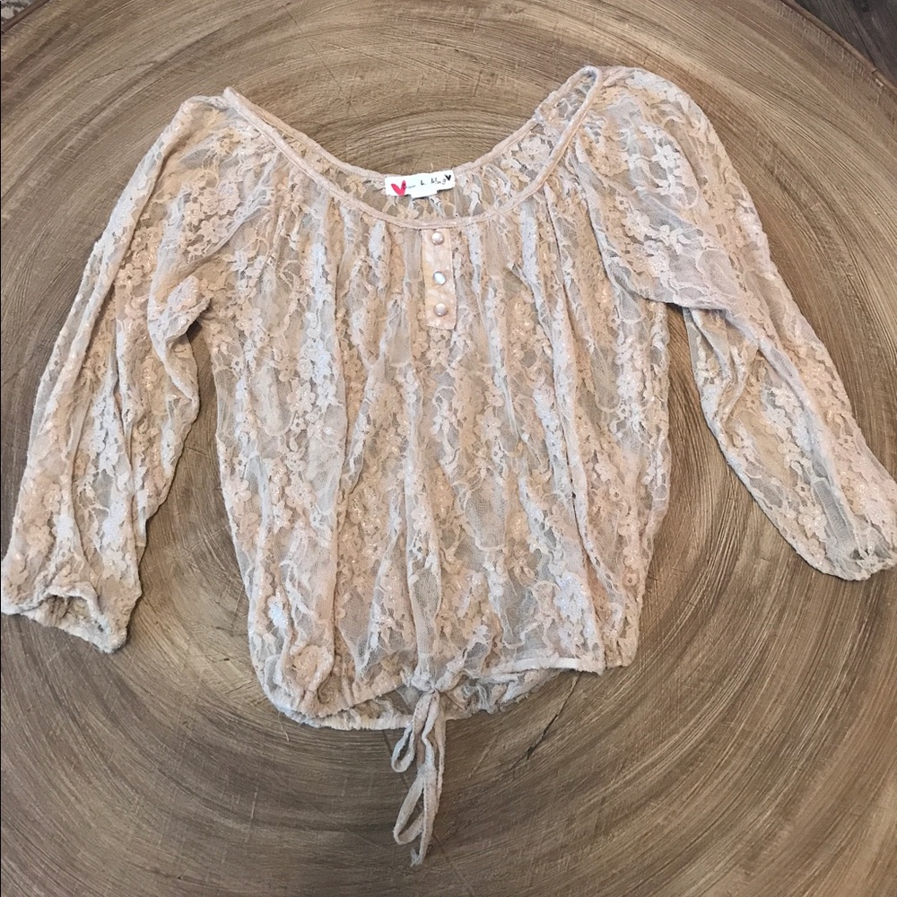 A Cream Lace Blouse.