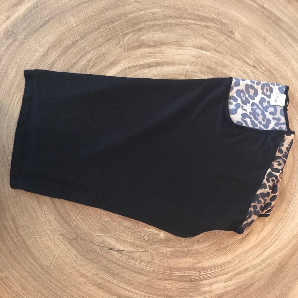 A Black Shirt with a Cheetah Print Back.