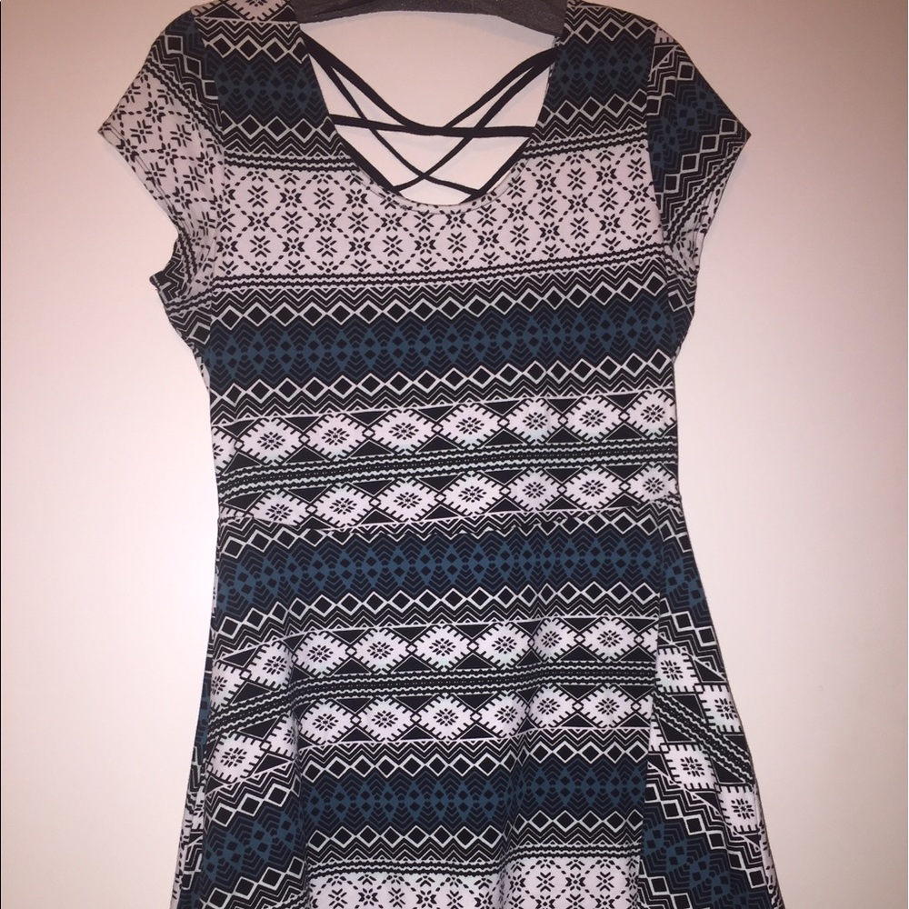 White blue and black sleeveless dress
