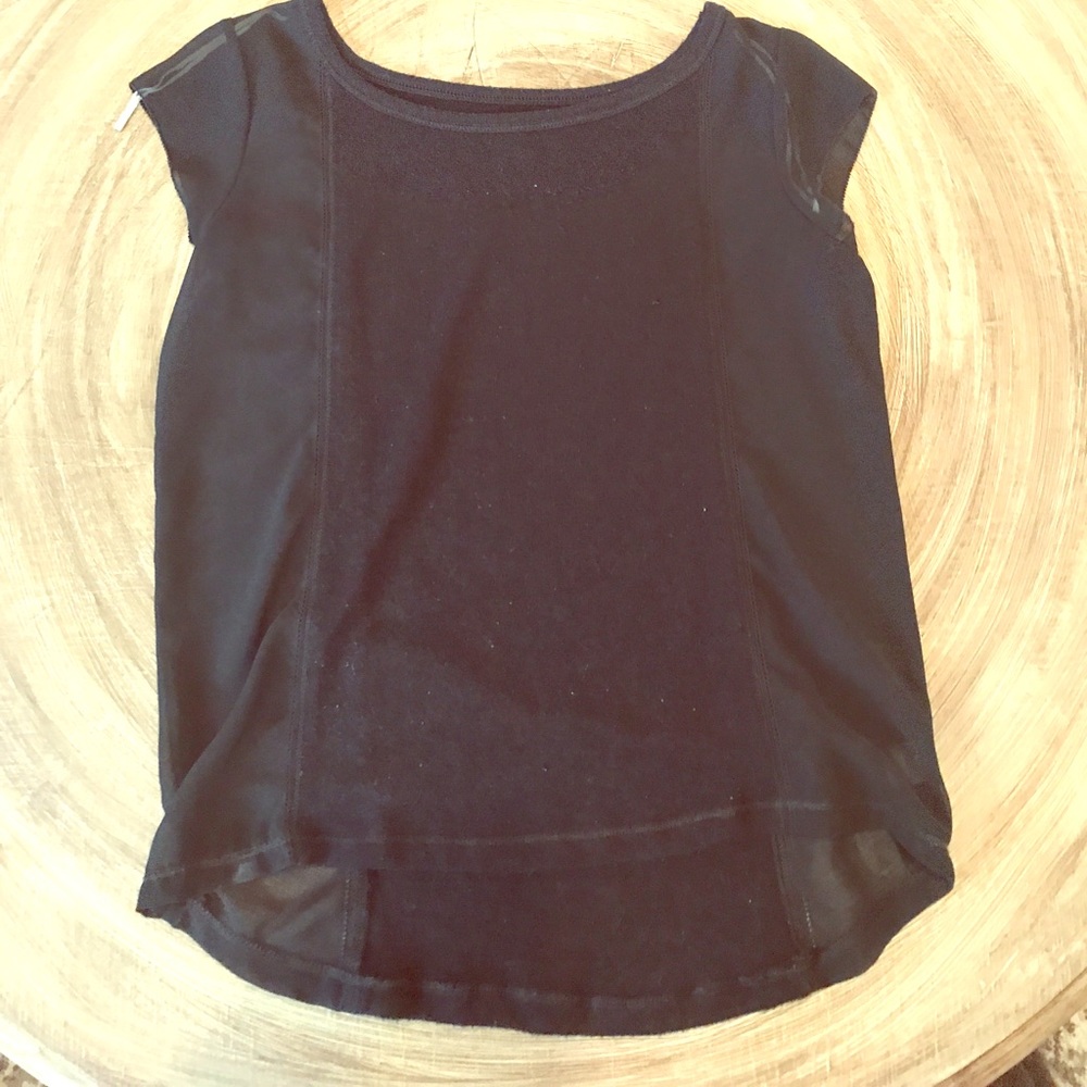A Black Shirt with Sheer Black Sides.