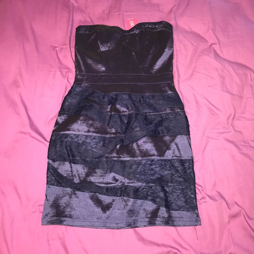 Dress size L, never been worn, sales tag attached