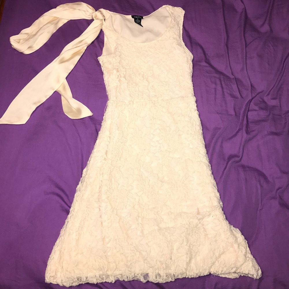 Dress size small, ties around waste