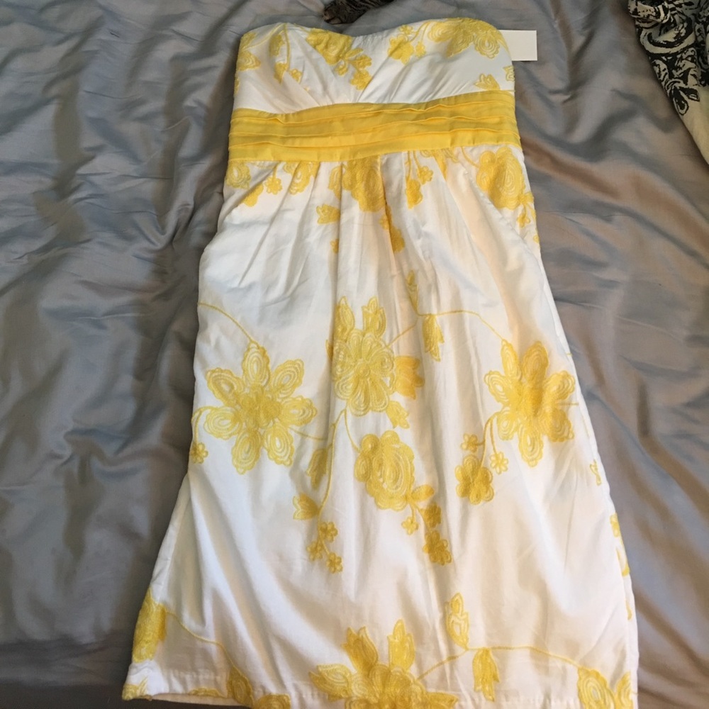 Yellow and white dresa