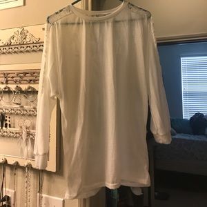 White three quarter sleeve with lace back/arm slit