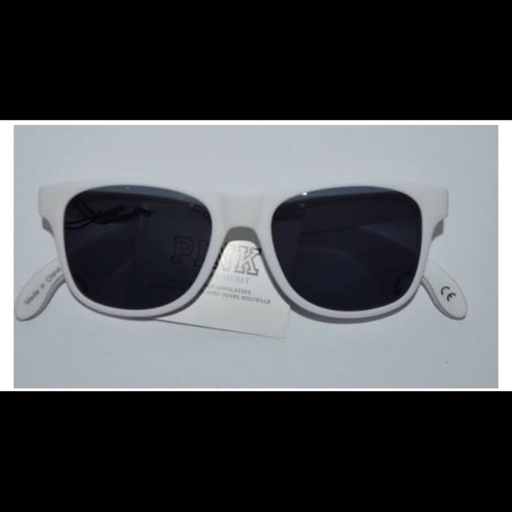 White sunglasses with bottle opener on side