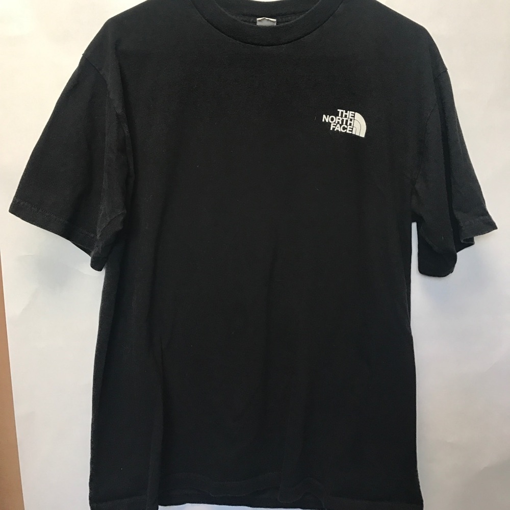 Never stop exploring north face tee